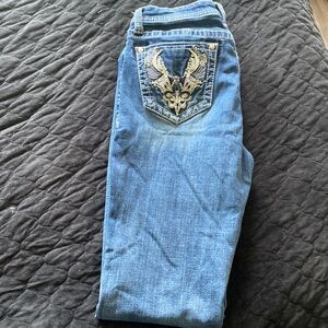 Size 30, woman’s denim Grace jeans.